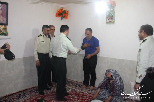 دیدار فرماندار و رئیس پلیس مبارزه با مواد مخدر کشور با خانواده شهید مبارزه با مواد مخدر 