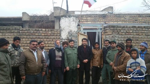 آیین نصب پرچم  در سر درب منازل خانواده  شهدای روستاهای گالیکش