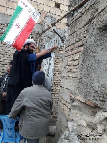 آیین نصب پرچم  در سر درب منازل خانواده  شهدای روستاهای گالیکش