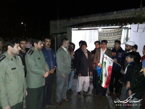 آیین نصب پرچم  در سر درب منازل خانواده  شهدای روستاهای گالیکش