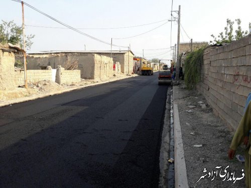 اجرای پروژه آسفالت معابر در روستاي احمدآباد شهرستان آزادشهر