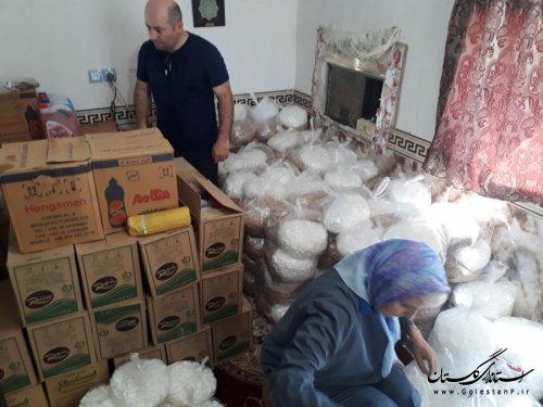 توزیع 320 بسته بهداشتی و غذایی بین 160 خانوار سیل زده در آق قلا