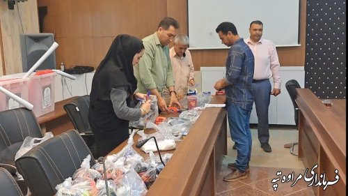 بازدید رئیس ستاد انتخابات شهرستان مراوه‌تپه از روند توزیع اقلام و آماده سازی صندوق‌های أخذ رأی