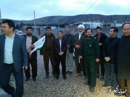 نصب پرچم عزت واقتدار بر سردرب منازل 17 شهید بخش پیشکمر و شهرفراغی