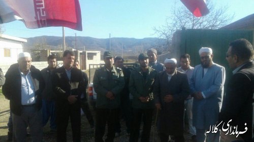نصب پرچم بر سردرب منزل خانواده محترم شهدادر روستاهای بخش مرکزی