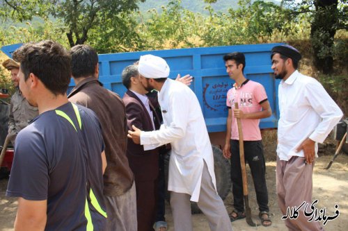 مشارکت مردم دو روستای زاو بالا و پایین در اجرای عملیات زیرسازی و شن ریزی مسیر تفرجگاه چشمه زاو