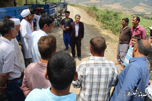 مشارکت مردم دو روستای زاو بالا و پایین در اجرای عملیات زیرسازی و شن ریزی مسیر تفرجگاه چشمه زاو