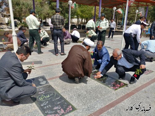 غبار روبی و عطرافشانی گلزار شهدای شهرستان کلاله