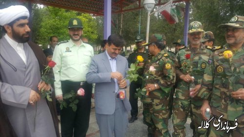 غبار روبی و غطر افشانی مزار شهدا شهرستان کلاله
