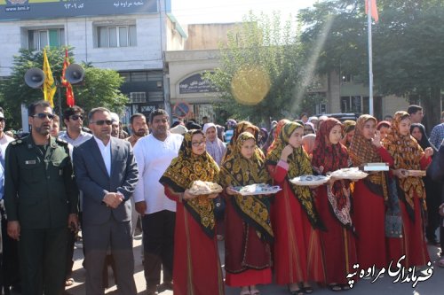 حضور پرچم متبرک و کاروان خدام حرم رضوی (ع) در شهرستان مراوه تپه 