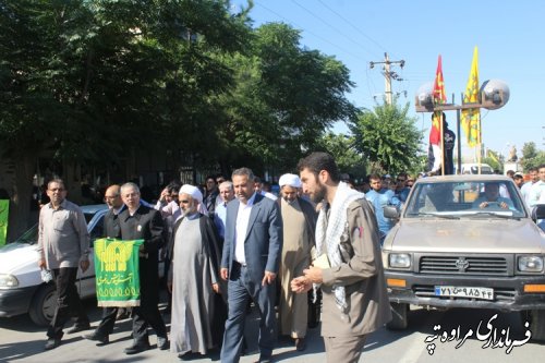 حضور پرچم متبرک و کاروان خدام حرم رضوی (ع) در شهرستان مراوه تپه 