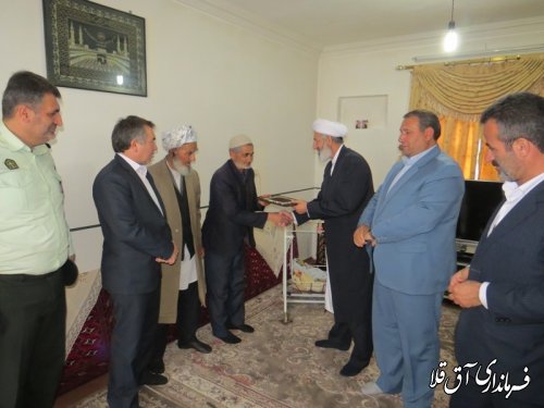 دیدار فرماندار شهرستان آق قلا با جانباز "حاج محمد ایزدی" در روستای دوگونچی