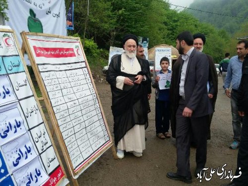 بازدید آیت الله شاهرودی ازکمپ هلال احمر