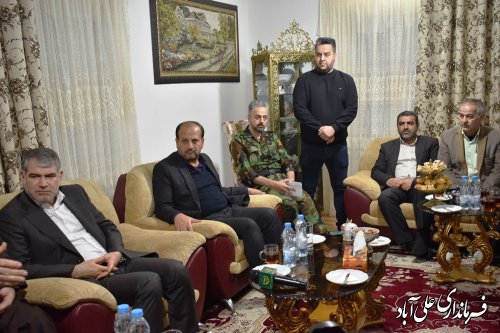 دیدار وزیر جهادکشاورزی با همراهی فرماندار علی آبادکتول از خانواده شهید جهادگر در روستای کردآباد