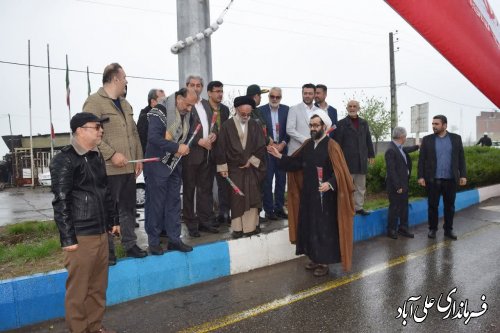 اهتزاز پرچم مقدس جمهوری اسلامی ایران به مناسبت 12 فروردین در علی آبادکتول 