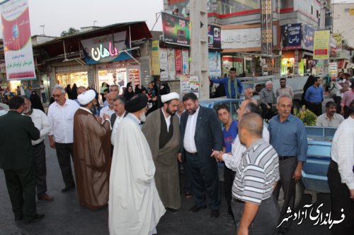 با حضور خدام امام رضا(ع) در شهرستان آزادشهر،فضای معنوی و عطرآگین حرم در شهر پیچید