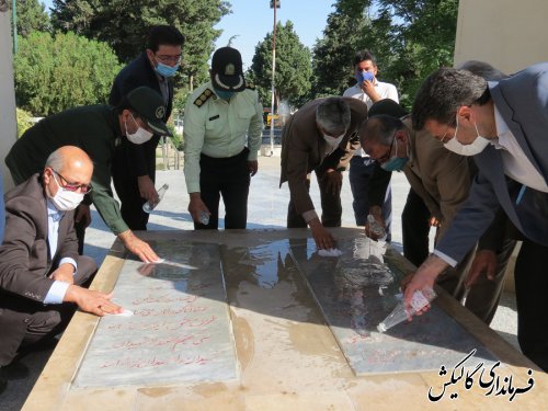 غبارروبی وعطرافشانی گلزار مطهر شهدای گمنام گالیکش بمناسبت گرامیداشت هفته مبارزه با مواد مخدر 