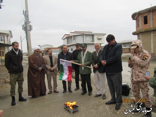 آیین نصب پرچم در سردرب منازل شهدای شهرستان گمیشان برگزار شد